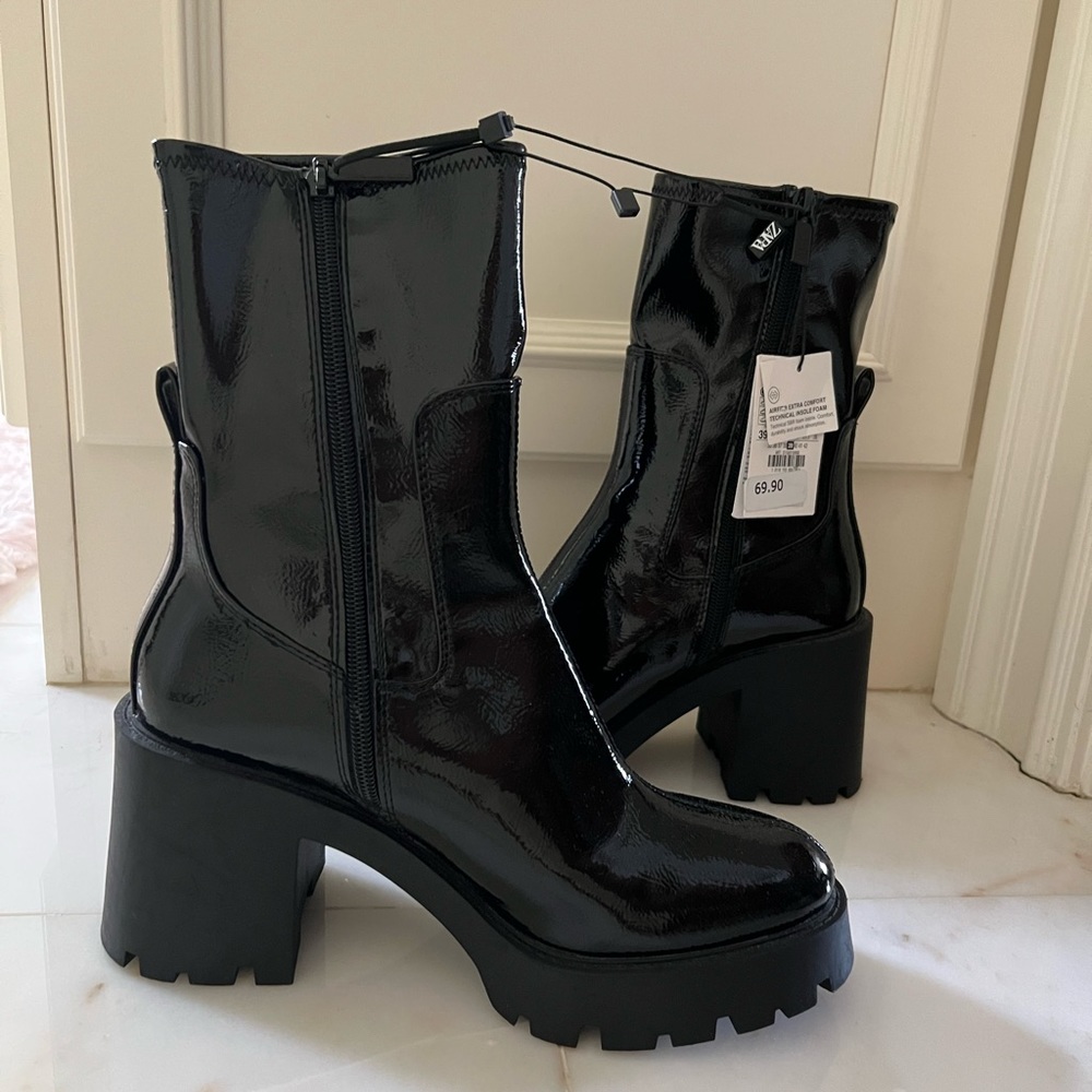 New with out tags now
 FAUX PATENT LEATHER HEELED LUG SOLE ANKLE BOOTS SIZE 39